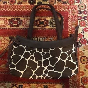 Brown Thirty-One skirt purse with additional skirt and organizer insert.